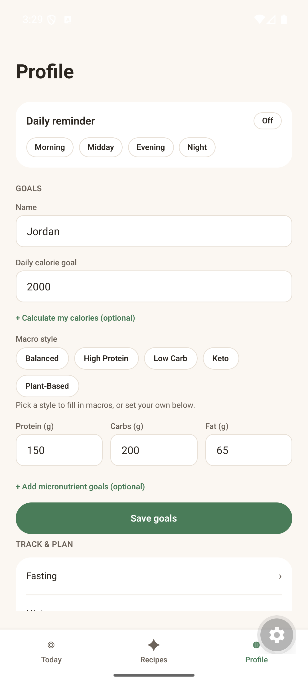 Profile screen with goals, macro style presets, and daily reminder settings